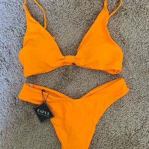 Neon orange swimsuit